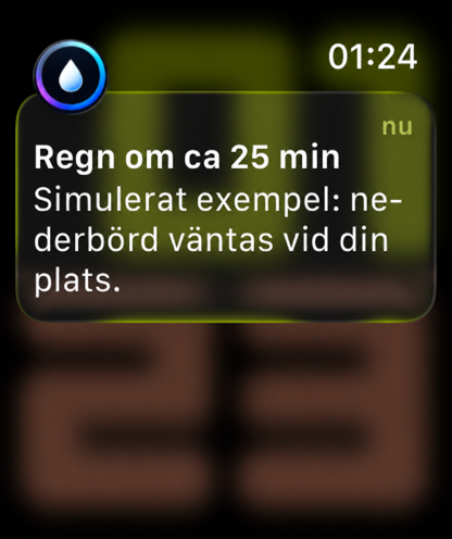 Apple Watch med en notis från DrippDropp: Regn om ca 25 min. Simulerat exempel, bildredigerat utan systemknappen Avfärda.